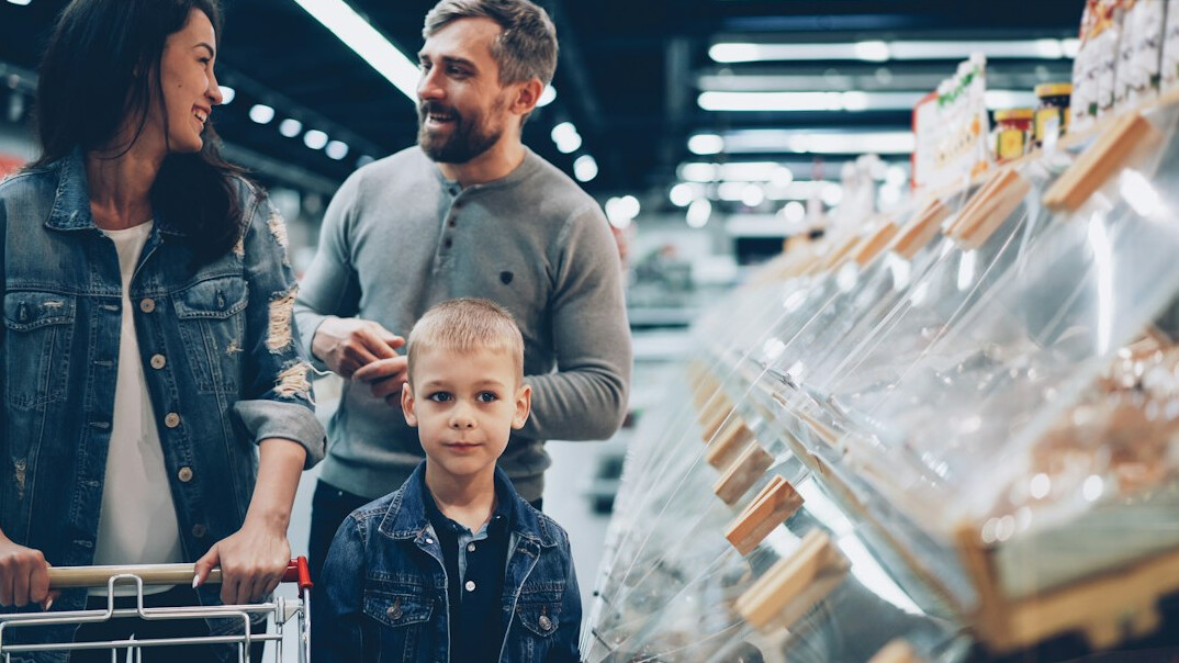 couple shopping in grocery store